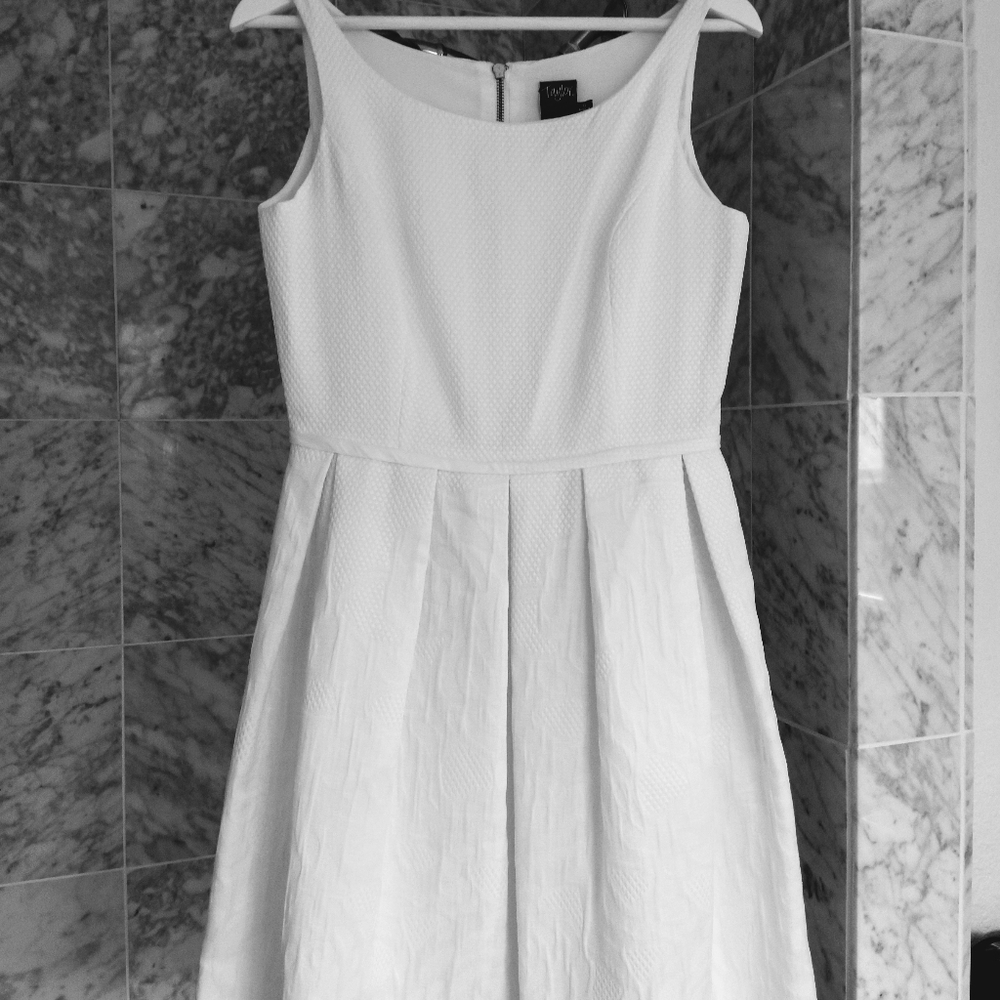 Textured brocard type pleated winter white dress